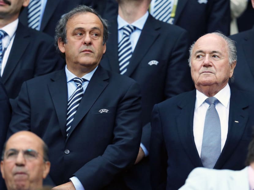 Platini’s (left) unhealthy relationship with Blatter and FIFA has placed Europe centre stage in a scandal it liked to depict as World Cup-related. Photo: Getty Images
