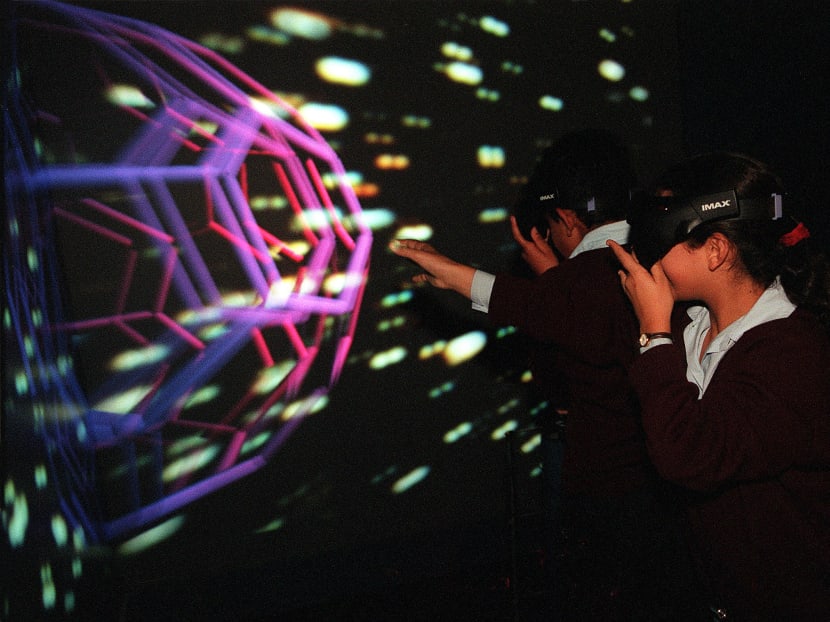 Students at a VR exhibition in Australia. AFP file photo