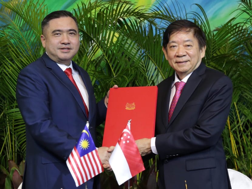 Singapore Transport Minister Khaw Boon Wan (right) and his Malaysian counterpart Anthony Loke during the RTS Link Supplemental Agreement Signing Ceremony on Tuesday (May 21).