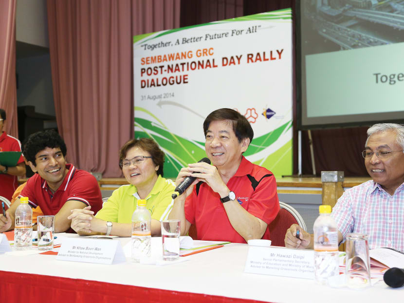 National Development Minister Khaw Boon Wan (centre) hints that home owners may be allowed to retain a range of leases under the Lease Buyback Scheme. Photo: People’s Association