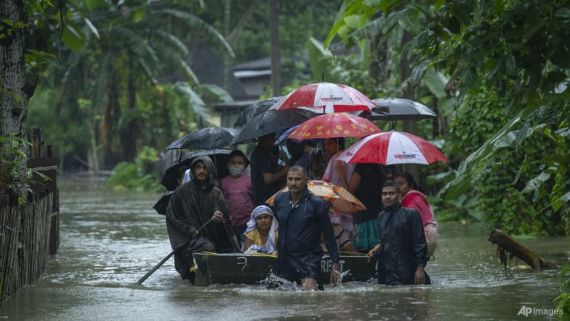 Death toll rises, millions stranded as monsoon floods ravage India and Bangladesh Death toll rises, millions stranded as monsoon floods ravage India and Bangladesh