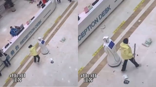 中国医院上演“人机大战” 女子持棒怒砸机器人