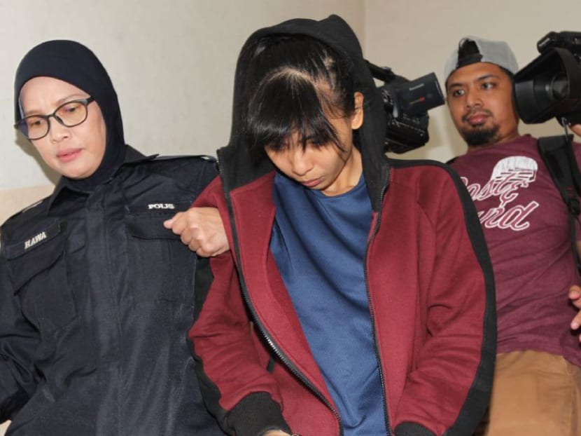 Sam Ke Ting (centre) at the Johor Baru magistrate’s court where she pleaded not guilty to a charge of dangerous and reckless driving which claimed the lives of eight teenage cyclists on Feb 18, 2017. Photo: New Straits Times