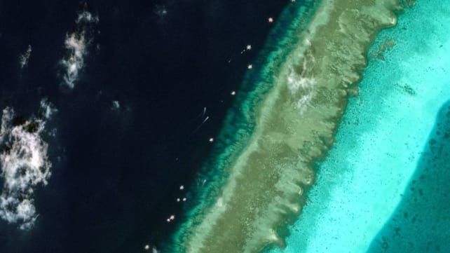 Philippines says China should allow scrutiny of disputed shoal