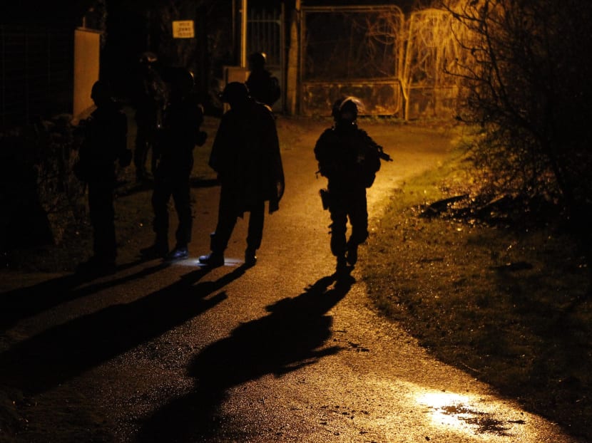 Armed police officers patrolling the streets at night on Jan 8, 2015 in the aftermath of the Charlie Hebdo attack. AP file photo