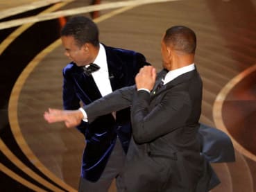 Comedian Chris Rock unleashes on Will Smith and wife Jada a year after Oscars slap