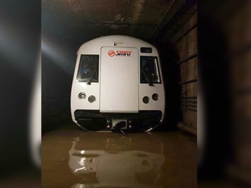 An SMRT train in a flooded MRT tunnel, in a photo widely circulated on social media.