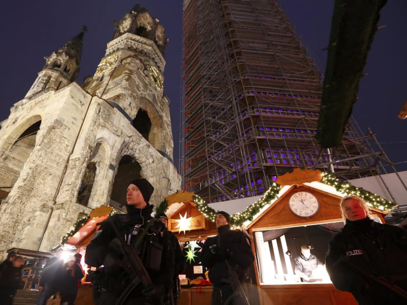Police patrol at the re-opened Christmas market at Breitscheid square in Berlin, Germany, Dec 22, 2016, following an attack by a truck which ploughed through a crowd at the market on Monday night.   Photo: Reuters