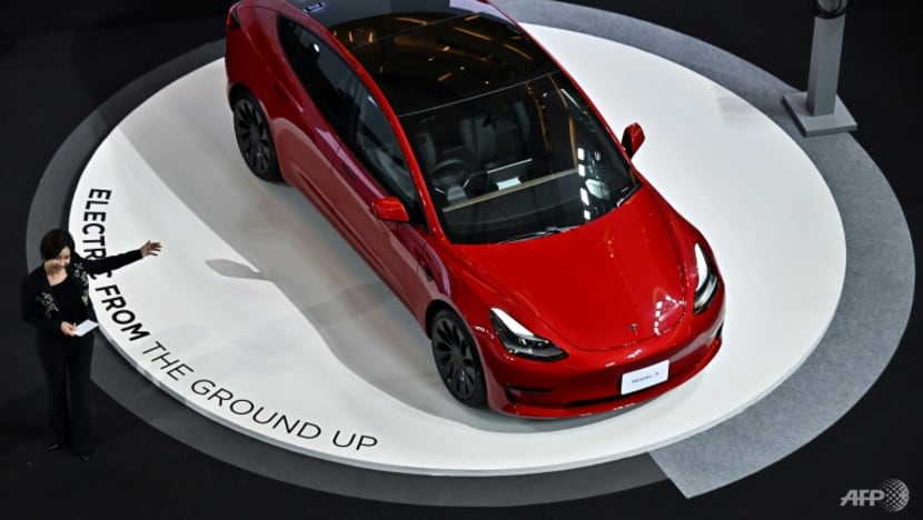 Between new rivals and a distracted boss, Tesla suffers on Wall Street Between new rivals and a distracted boss, Tesla suffers on Wall Street