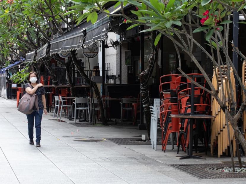 Chairs stacked outside shuttered eateries in China Square Central in May 2020.