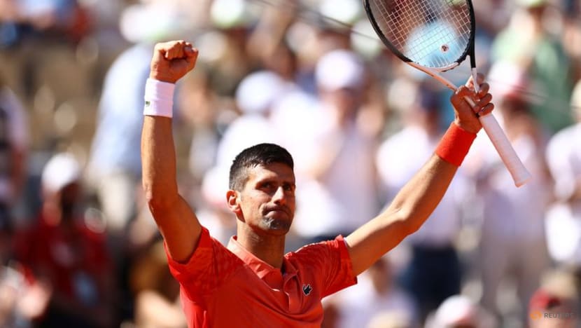 Djokovic edges closer to Grand Slam record with spot in last eight