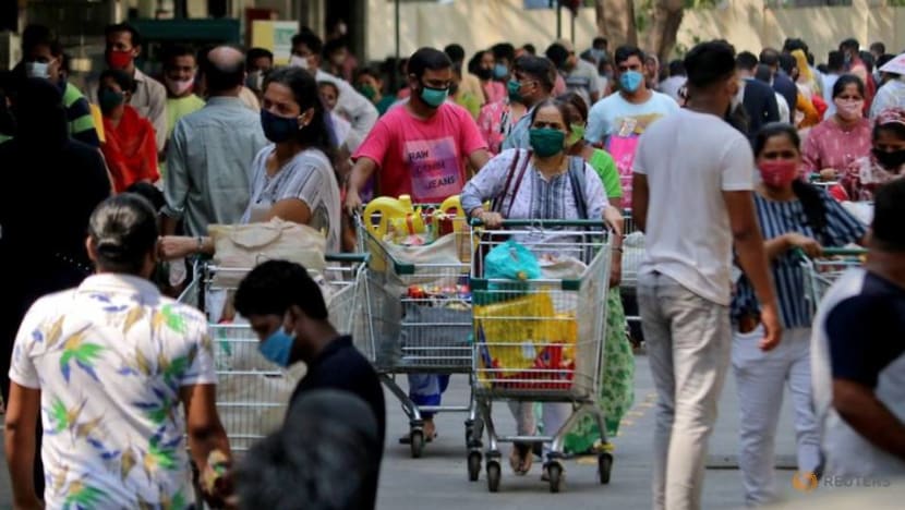 Indian hospitals battle 'chaotic' surge as daily COVID-19 infections cross 200,000 Indian hospitals battle 'chaotic' surge as daily COVID-19 infections cross 200,000