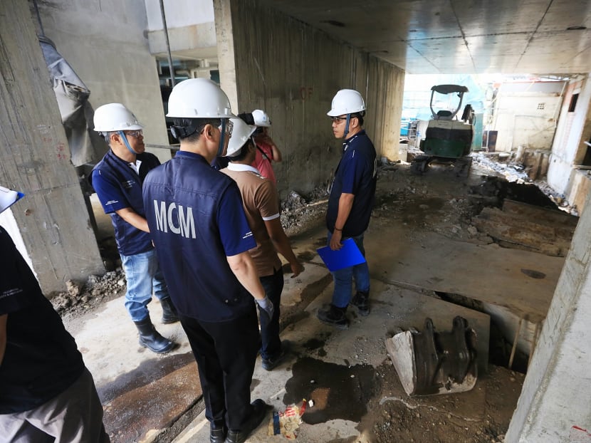 A Workplace Safety and Health (WSH) site inspection by The Ministry of Manpower (MOM) and Minister of State for Manpower Sam Tan, at one of the worksite at Geylang on Thursday (May 12). Photo: Koh Mui Fong/TODAY