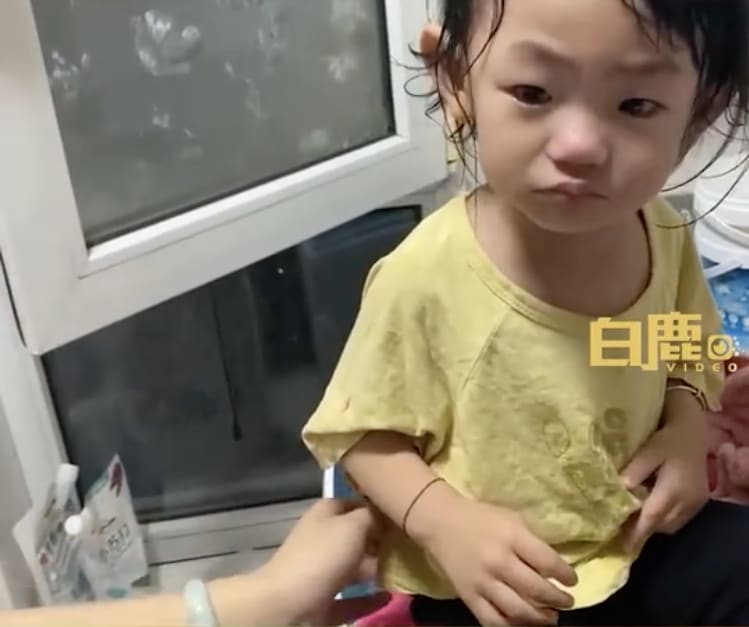 A toddler from China (pictured) called her father a "hooligan" when he tried to bathe her.
A toddler from China (pictured) called her father a "hooligan" when he tried to bathe her.