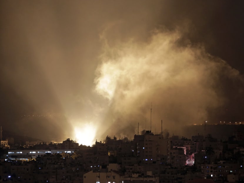 Smoke raises in the air following Israeli shelling in Gaza City on early Tuesday, July 29, 2014. Photo: AP