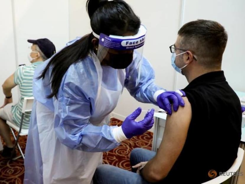As Malaysia grapples with record COVID-19 cases, authorities ramp up mass vaccination to stem the tide As Malaysia grapples with record COVID-19 cases, authorities ramp up mass vaccination to stem the tide