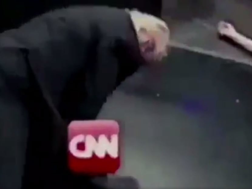 A screengrab from the video showing Trump taking down 'CNN' at a pro-wrestling event.