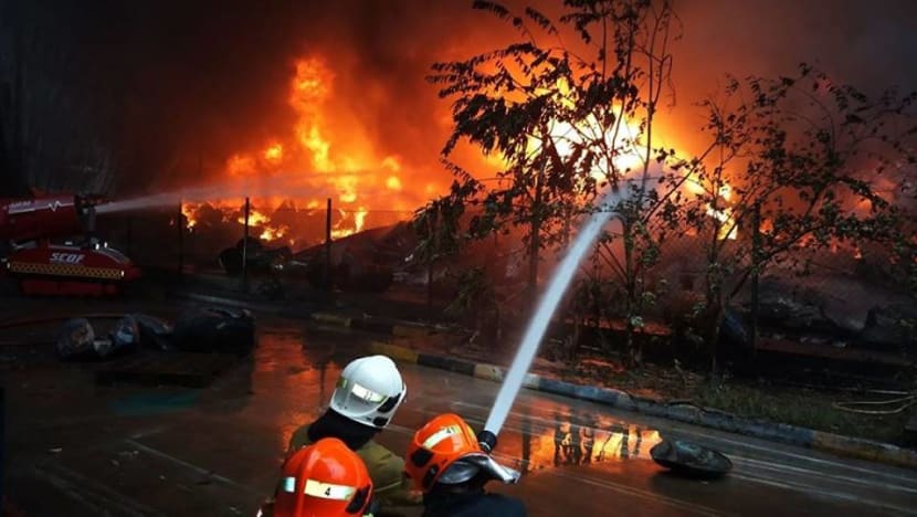 More than 100 firefighters battle blaze at Tuas Crescent building, fire put out after six hours More than 100 firefighters battle blaze at Tuas Crescent building, fire put out after six hours