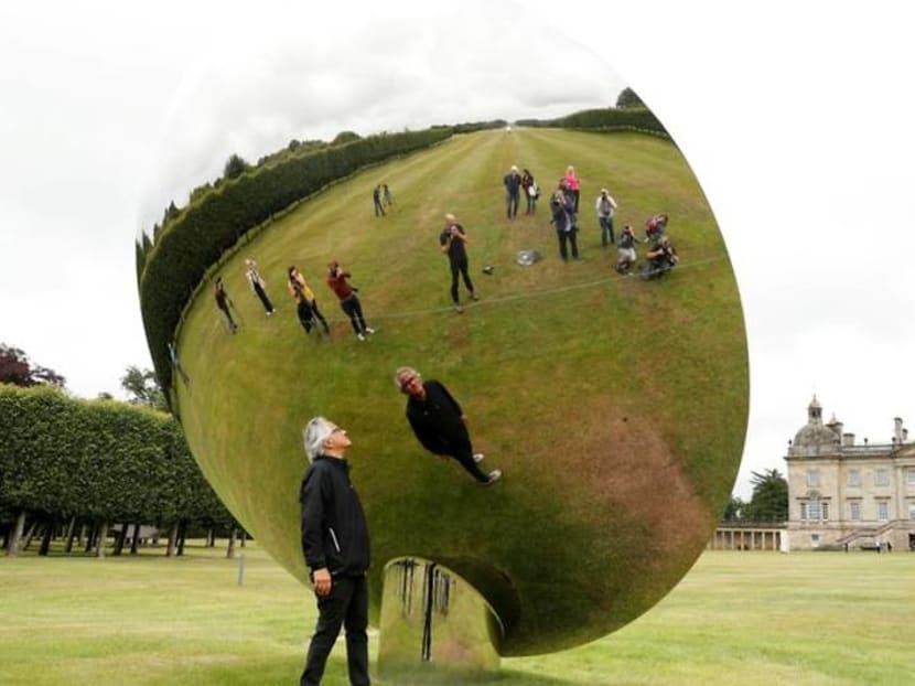 Sculptor Anish Kapoor exhibits at Houghton Hall in former PM Robert Walpole's mansion Sculptor Anish Kapoor exhibits at Houghton Hall in former PM Robert Walpole's mansion
