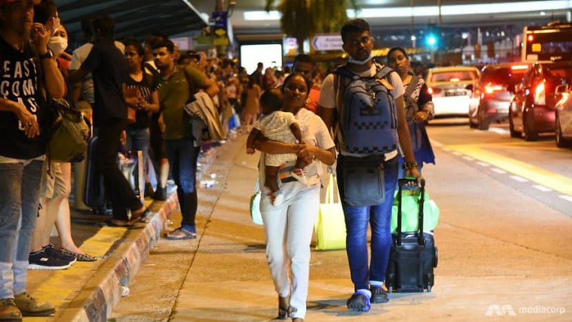 In pictures: Crowds, traffic jams as last JB commuters enter Singapore ahead of Malaysia's COVID-19 travel restrictions In pictures: Crowds, traffic jams as last JB commuters enter Singapore ahead of Malaysia's COVID-19 travel restrictions
