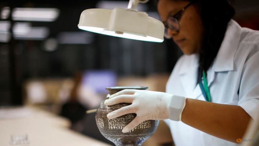 Brazilians work to restore relics damaged in Congress riot Brazilians work to restore relics damaged in Congress riot