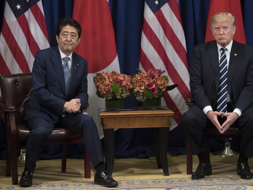 Japanese Prime Minister Shinzo Abe meets with US President Donald Trump in New York in September 2017. As Mr Abe heads to Florida to meet Mr Trump, Japan wonders if the embattled premier can bounce back as scandals pile up.