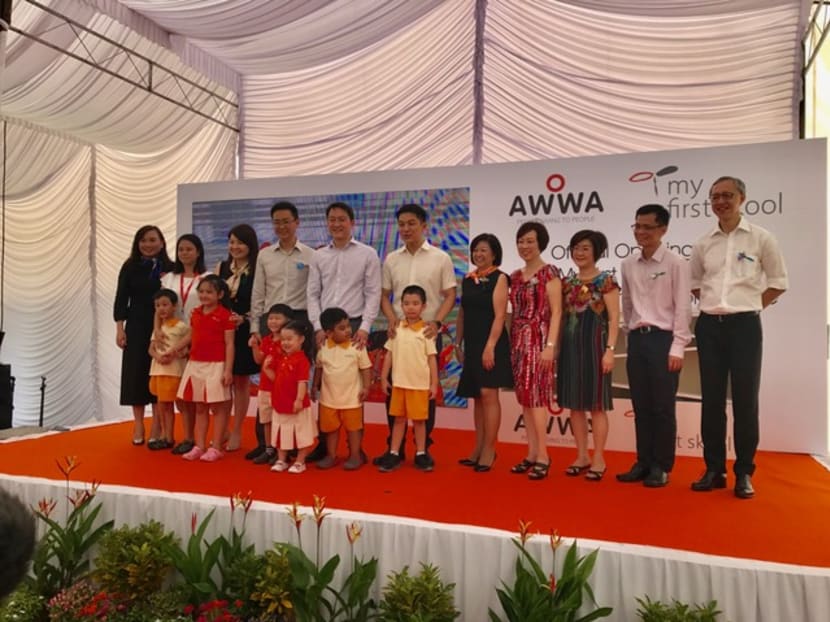 Mr Tan Chuan-Jin (back row, sixth from left), Social and Family Development Minister, officiated the opening ceremony for My First Skool and AWWA Early Intervention Centre at Fenrvale in Sengkang on Monday (July 10). Photo: NTUC First Campus