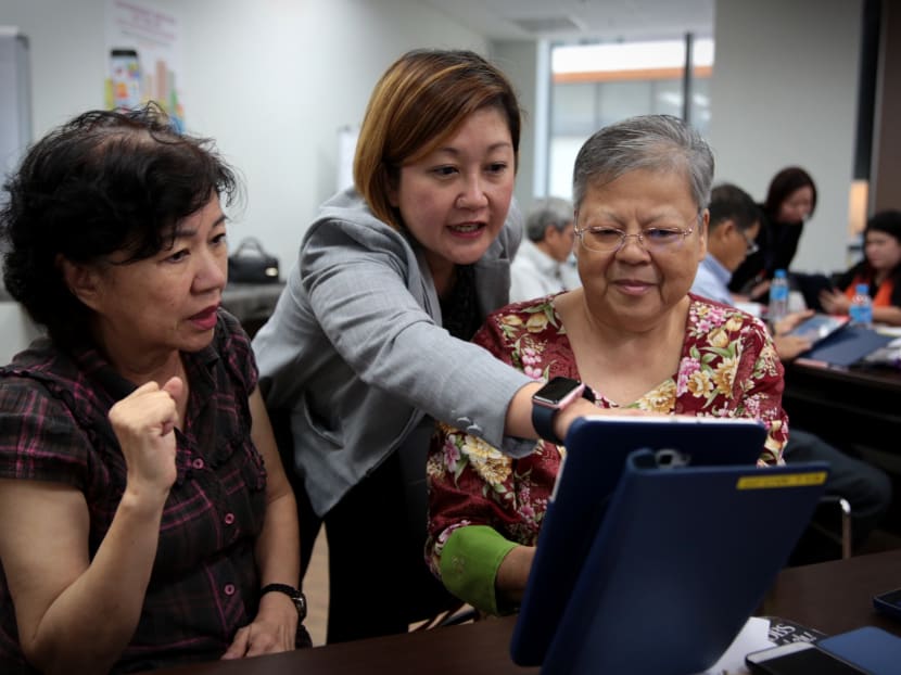 Participants learn how to use the Carousell app at a course by NYP-SIRS at the official launch of the SkillsFuture for Digital Workplaces programme. Photo: Jason Quah/TODAY