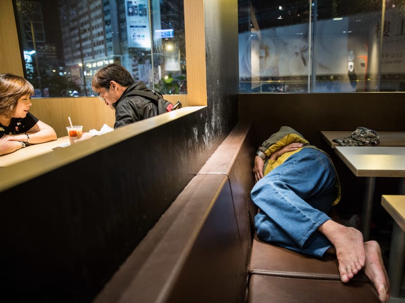 Hong Kong's working poor choose streets over dismal housing