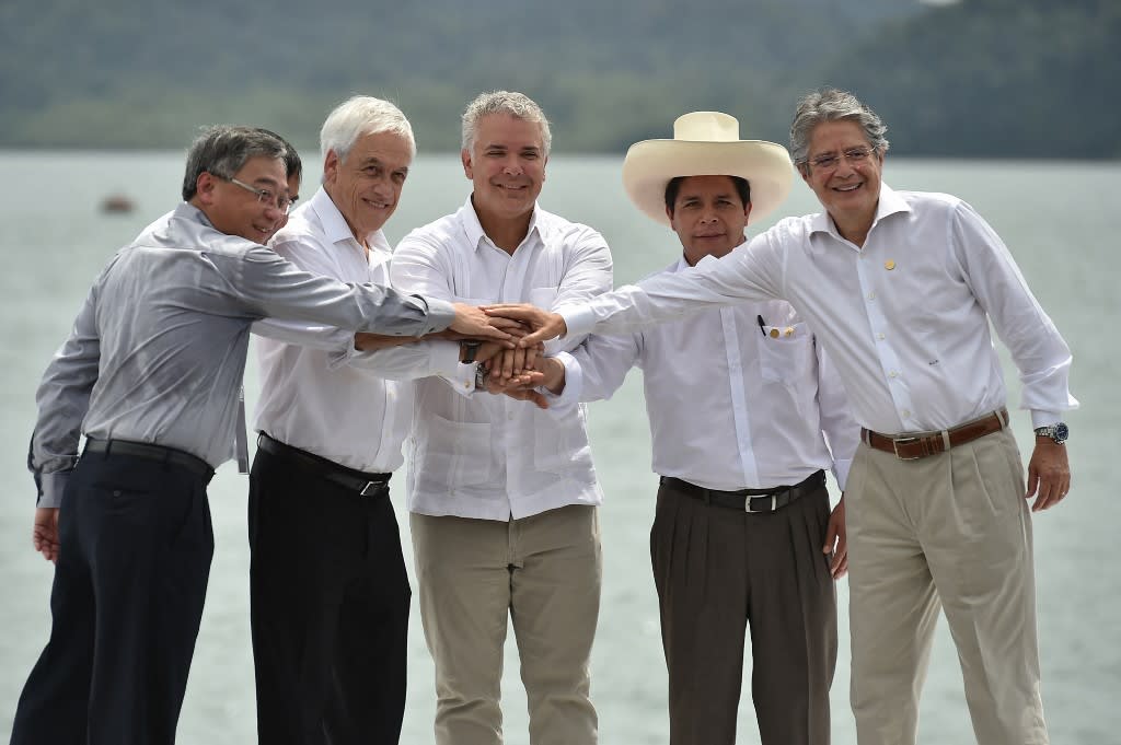(Left to right) Singapore’s Minister for Trade and Industry Gan Kim Yong, Mexican Secretary of the Treasury Rogelio Ramirez de la O, Chilean President Sebastian Pinera, Colombian President Ivan Duque, Peruvian President Pedro Castillo and Ecuadorian President Guillermo Lasso, pose during the XVI Pacific Alliance presidential summit family photo at the Malaga Naval Base, near the seaport of Buenaventura, Colombia, on Jan 26, 2022.