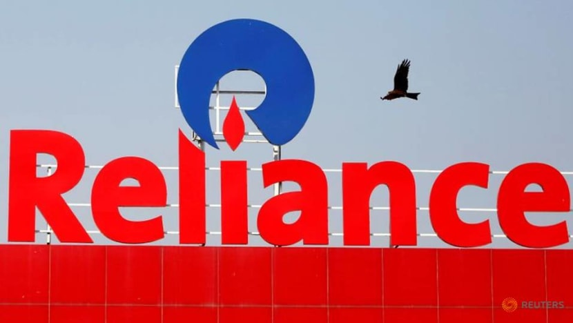India's Reliance Industries and chairman fined over share trades India's Reliance Industries and chairman fined over share trades