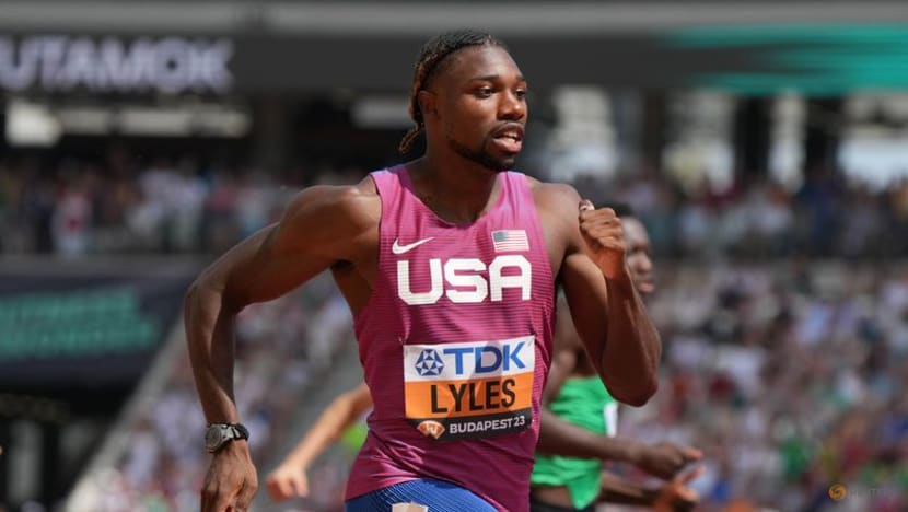 Lyles clocks fastest time in semis after cart crash