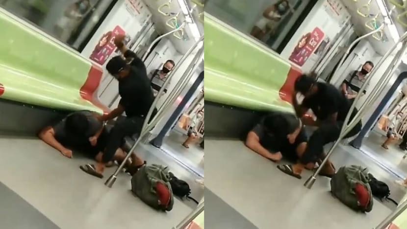 Man arrested after allegedly assaulting another commuter on Downtown Line train