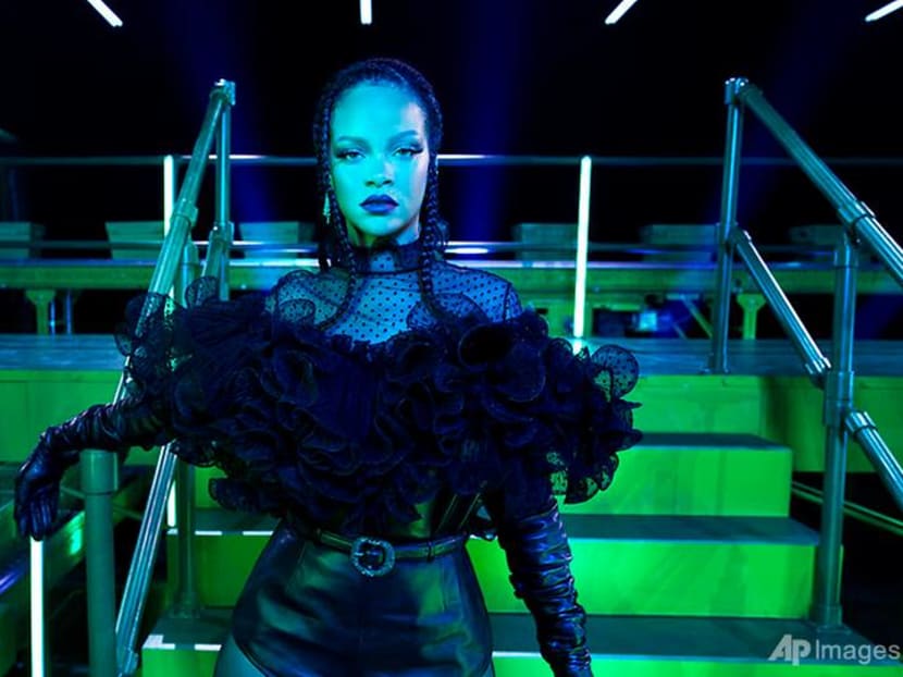 Rihanna wants to cheer up a troubled world with a fashion show Rihanna wants to cheer up a troubled world with a fashion show