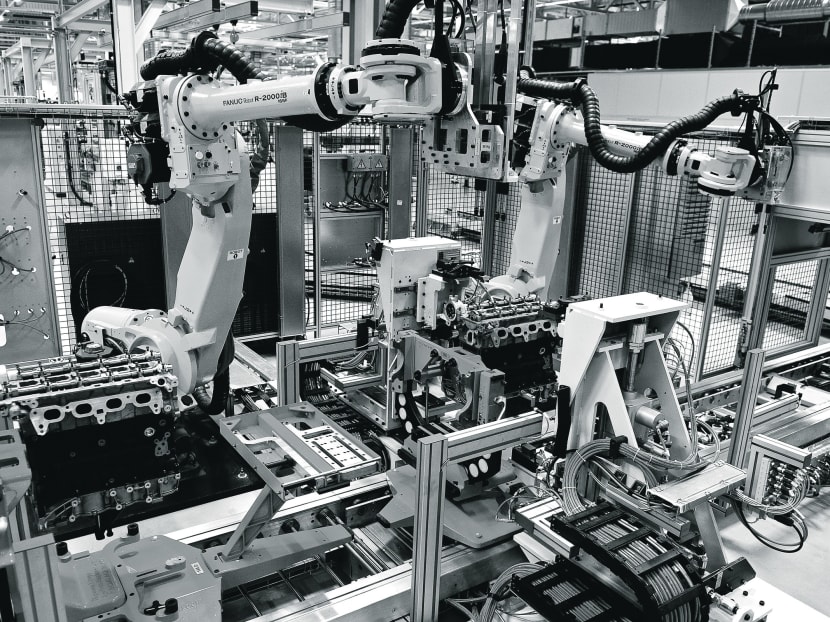 Automobile engines pass beneath Fanuc robots as they move along the production line. Japan stands at the top in the number of companies to make the list, not surprising given its high-tech capabilities and sophisticated buyers. Photo: Bloomberg