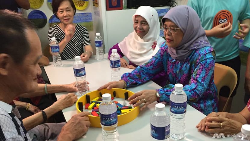 President Halimah Yacob plays board games with elderly to promote intergenerational bonding President Halimah Yacob plays board games with elderly to promote intergenerational bonding