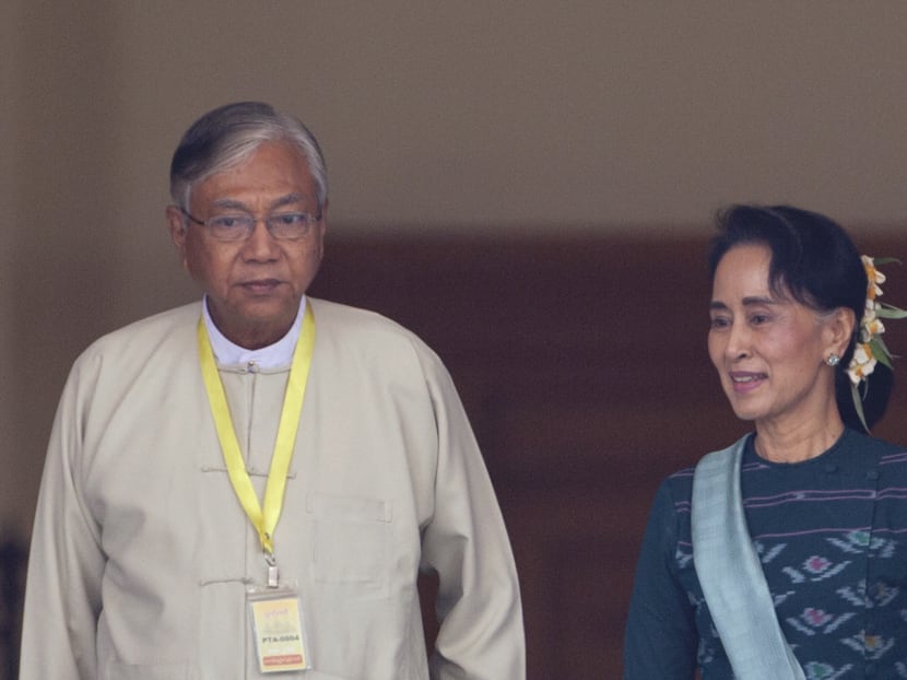 Mr Htin Kyaw, left, president of Myanmar walks with NLD leader Aung San Suu Kyi in Myanmar's parliament in Naypyitaw, Myanmar on March 15, 2016. Photo: AP