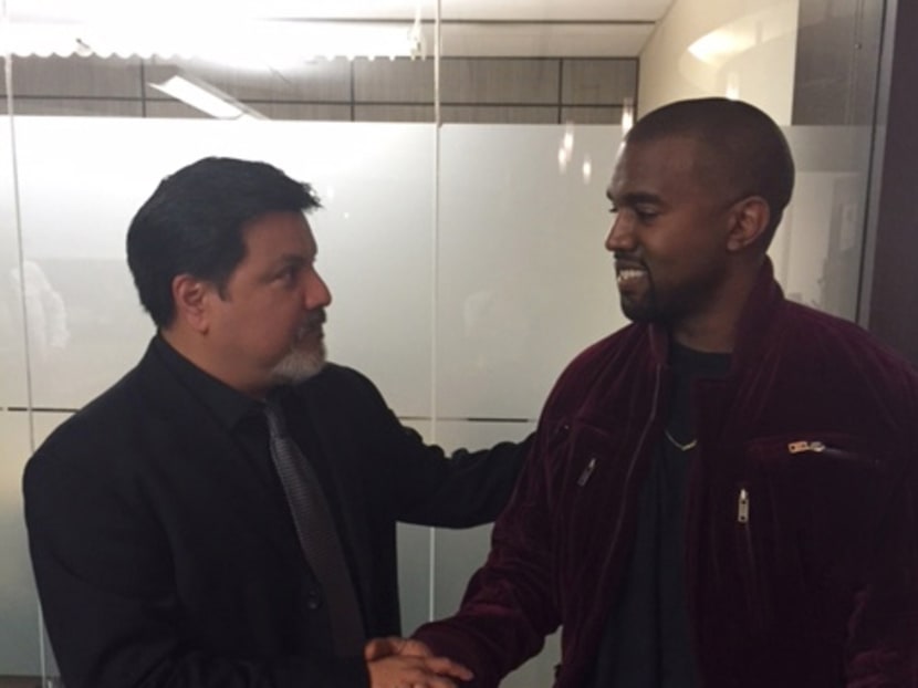 Daniel Ramos, left, and Kanye West, shaking hands after West apologised to Ramos as part of a settlement, in Los Angeles. This assault case was set for trial next week on April 14, 2015, but Ramos' lawyer, Gloria Allred, filed for a dismissal on April 7, after a settlement was agreed to by both parties. Photo: AP