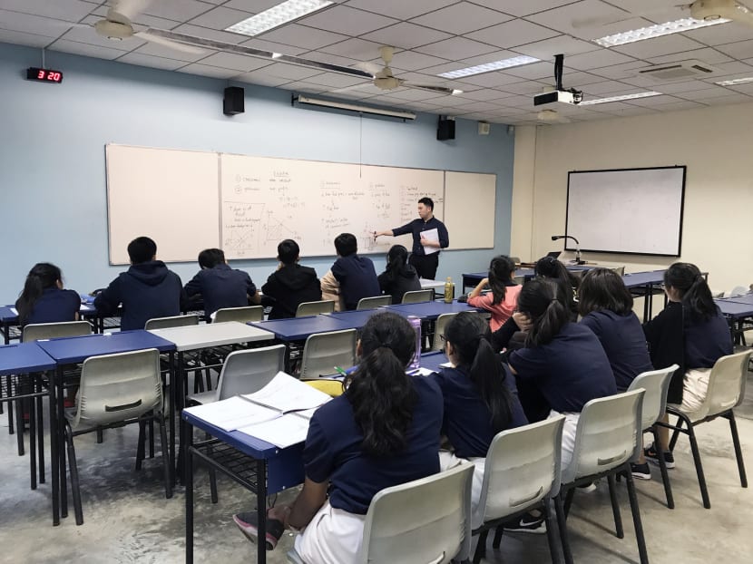 A class in session at Serangoon Junior College (JC) yesterday. It will merge with Anderson JC, with the merged school located at the latter’s site. The overall exercise involves eight junior colleges, six secondary schools and 14 primary schools. Photo: Esther Leong