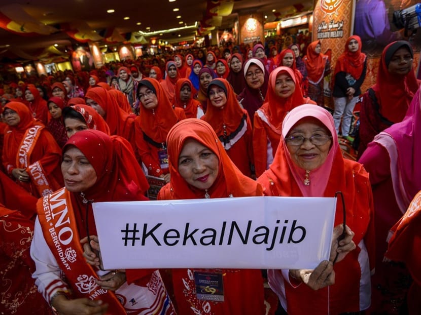 Delegates at the UMNO general assembly gave president Najib Razak a rousing welcome but critics are told to shut their mouths for the sake of party unity. Photo: The Malaysian Insider