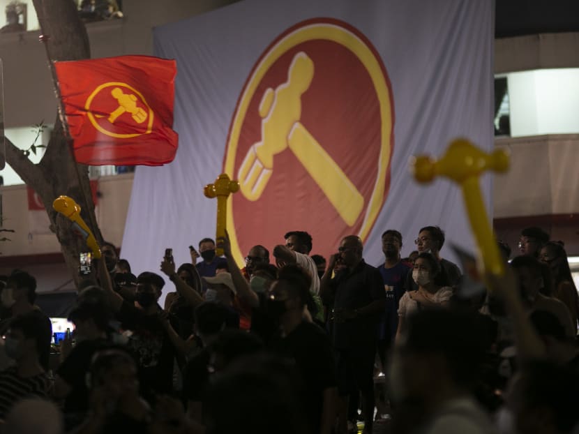 Workers' Party supporters gathered and cheered at Block 322 Hougang Avenue 5 in Hougang SMC as the GE2020 results were announced.