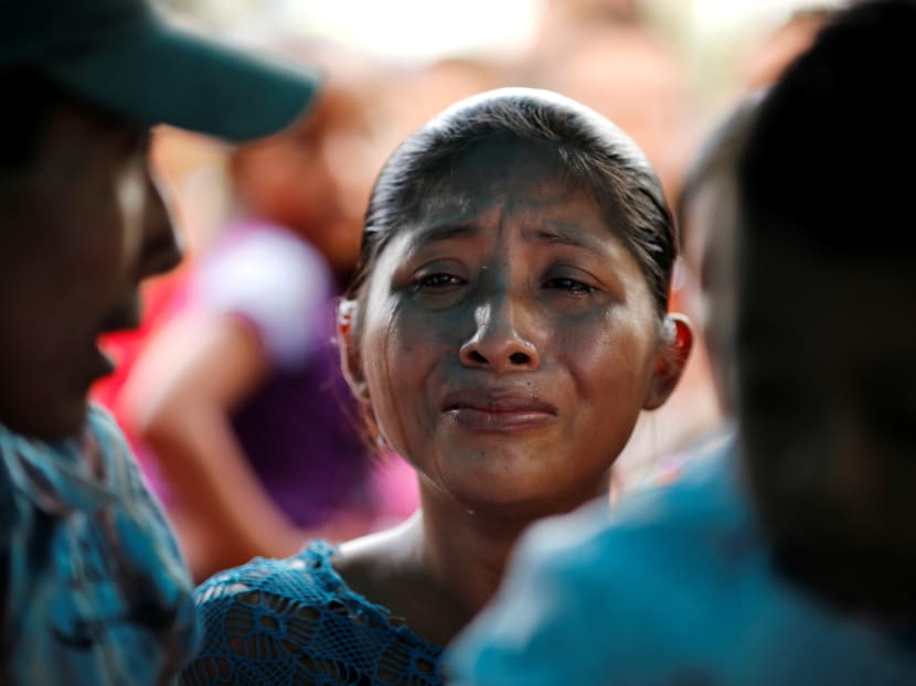 Photo of the day: Claudia Maquin, mother of Jakelin Caal, a 7-year-old girl who handed herself in to US border agents earlier this month and died after developing a high fever while in the custody of US Customs and Border Protection, reacts during her daughter's funeral at her home village of San Antonio Secortez, in Guatemala.