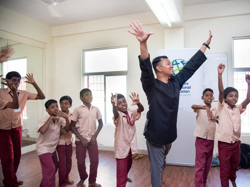 Mr Muhammad Noramin Mohamed Farid (centre), artistic director of Bhumi Collective, believes that a lot more can be done to sustain the interest of young people in keeping cultural heritage alive.