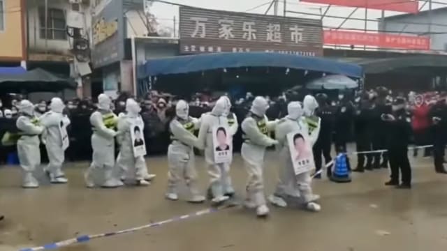 广西嫌犯“游街示众”引争议 当地政府：是警示 没有不合适