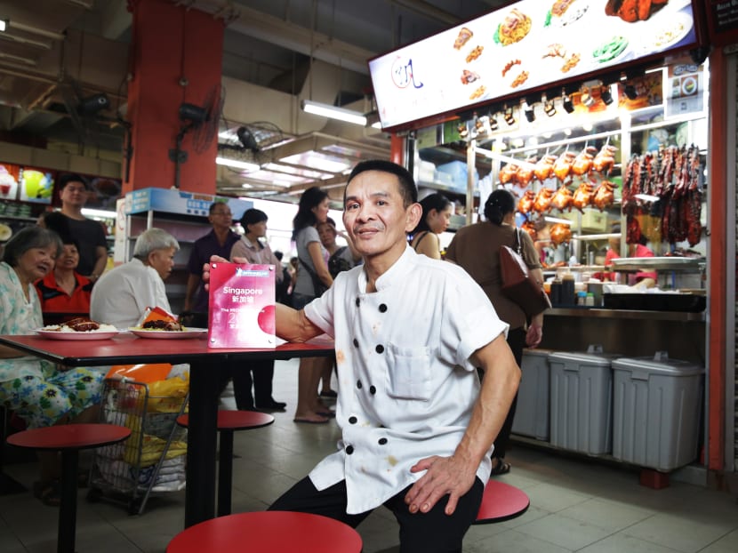 Owner of Hong Kong Soya Sauce Chicken Rice and Noodles Chan Hon Meng, in front of his stall in Chinatown Food Complex. Photo: Nuria Ling