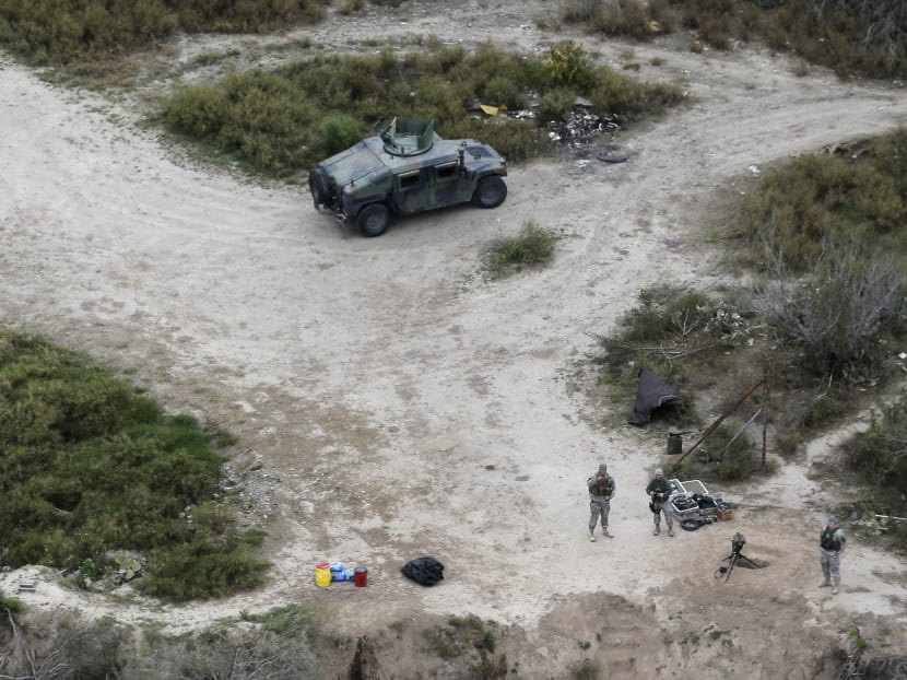 Members of the National Guard patrol along the Rio Grande at the Texas-Mexico border, Tuesday, Feb 24, 2015, in Rio Grande City, Texas. Photo: AP