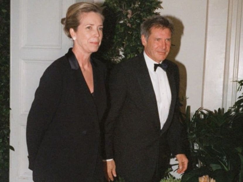 Harrison Ford and his wife Melissa Mathison arrives at the White House for an official dinner for the British Prime Minister hosted by President Clinton in Washington in 1998. AP file photo