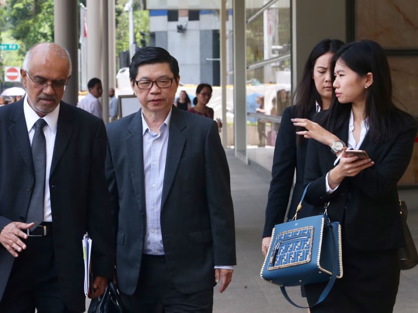 Wee Teong Boo (second from left)  seen at the Supreme Court on April 30, 2018.