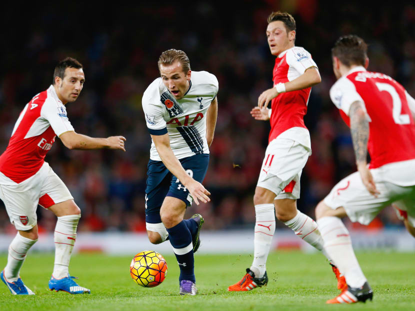 Harry Kane of Spurs takes on the Arsenal defence during the Barclays Premier League match between Arsenal and Tottenham Hotspur at the Emirates Stadium on Nov 8, 2015 in London, England.  Getty Images file photo