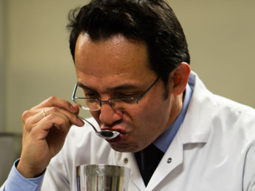 This man tastes coffee for a living